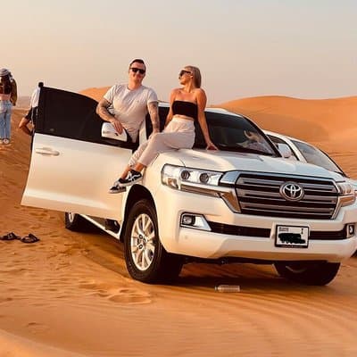 Dubai Desert Safari With Red Dune Bashing Camel Ride & BBQ Dinner